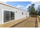 Large wooden deck overlooks a wooded area at 7041 Alan Blvd, Punta Gorda, FL 33982