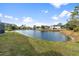 Scenic lake view from the backyard at 7117 Queen Palm Cir, Sarasota, FL 34243