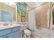 Charming bathroom with a toilet, bathtub, and mermaid-themed decor at 7123 Marsh View Terrace Ter, Bradenton, FL 34212