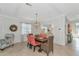 Formal dining room with wooden table and coral chairs at 7123 Marsh View Terrace Ter, Bradenton, FL 34212