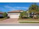 Single-story home with a two-car garage and attractive landscaping at 7123 Marsh View Terrace Ter, Bradenton, FL 34212