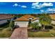 Single-story home with tile roof and landscaped yard at 7123 Marsh View Terrace Ter, Bradenton, FL 34212