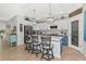 Modern kitchen with blue cabinets, white countertops, and an island at 7123 Marsh View Terrace Ter, Bradenton, FL 34212