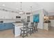 Modern kitchen with blue cabinets, white countertops and a large island at 7123 Marsh View Terrace Ter, Bradenton, FL 34212