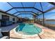 Stunning pool and spa with covered patio and lake view at 7123 Marsh View Terrace Ter, Bradenton, FL 34212