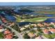 Aerial view of upscale waterfront homes and golf course at 735 Foggy Morn Ln, Bradenton, FL 34212