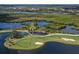 Golf course and water views in luxury community at 735 Foggy Morn Ln, Bradenton, FL 34212