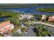 Aerial view of community clubhouse, pool, and marina at 735 Foggy Morn Ln, Bradenton, FL 34212