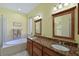 Bathroom features granite double vanity, soaking tub, and walk-in shower at 735 Foggy Morn Ln, Bradenton, FL 34212