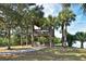 Wooden gazebo offering scenic views of surrounding nature at 735 Foggy Morn Ln, Bradenton, FL 34212