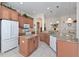 Spacious kitchen with granite countertops, island, and stainless steel appliances at 735 Foggy Morn Ln, Bradenton, FL 34212