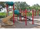 playground with modern equipment and a safe surface at 735 Foggy Morn Ln, Bradenton, FL 34212