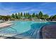 Inviting resort-style pool with ample lounge chairs and a relaxing atmosphere at 735 Foggy Morn Ln, Bradenton, FL 34212