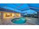 View of pool and outdoor living area at 7412 Links Ct, Sarasota, FL 34243