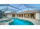 Beautiful pool and spa with covered patio at 7412 Links Ct, Sarasota, FL 34243