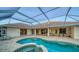 Outdoor pool area with ample seating and access to the house at 7412 Links Ct, Sarasota, FL 34243