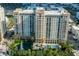 Luxury high-rise building with pool and fountain views at 750 N Tamiami Trl # 314, Sarasota, FL 34236