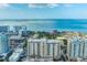 Aerial view of building and surrounding waterfront area at 750 N Tamiami Trl # 314, Sarasota, FL 34236