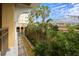 Relaxing balcony overlooking courtyard fountain at 750 N Tamiami Trl # 314, Sarasota, FL 34236