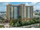 Elegant high-rise building with upscale finishes and landscaping at 750 N Tamiami Trl # 314, Sarasota, FL 34236