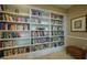 Well-stocked library with built-in bookshelves at 750 N Tamiami Trl # 314, Sarasota, FL 34236