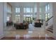 Spacious lobby with comfortable seating and high ceilings at 750 N Tamiami Trl # 314, Sarasota, FL 34236