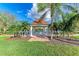 Picturesque gazebo overlooking a lake at 7879 Bergamo Ave, Sarasota, FL 34238