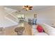 Spacious living area with a view of the kitchen and staircase at 7879 Bergamo Ave, Sarasota, FL 34238