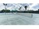 Well-maintained tennis courts with ample lighting at 7879 Bergamo Ave, Sarasota, FL 34238