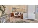 Formal dining area with six chairs and elegant chandelier at 804 Connemara Cir, Venice, FL 34292