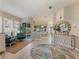 Bright and airy living room with stylish furniture and large windows at 804 Connemara Cir, Venice, FL 34292