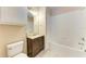 Clean bathroom with tub, vanity, and tile flooring at 8335 38Th Street E Cir # 303, Sarasota, FL 34243