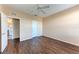 Bright bedroom with wood-look floors and ceiling fan at 8335 38Th Street E Cir # 303, Sarasota, FL 34243