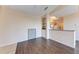 Dining area with wood-look floors and kitchen access at 8335 38Th Street E Cir # 303, Sarasota, FL 34243