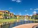 Scenic walkway along the lake with beautiful landscaping at 8335 38Th Street E Cir # 303, Sarasota, FL 34243