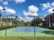 Well-maintained tennis court for residents' recreational use at 8335 38Th Street E Cir # 303, Sarasota, FL 34243