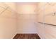 Spacious walk-in closet with wire shelving at 8335 38Th Street E Cir # 303, Sarasota, FL 34243