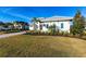 One-story home with paver driveway & lush lawn at 8497 Pavia Way, Bradenton, FL 34202