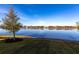 Scenic lake view with community homes at 8497 Pavia Way, Bradenton, FL 34202