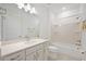 Well-lit bathroom with a single sink vanity and a tub-shower combination at 9405 Ballaster Pointe Loop, Parrish, FL 34219