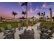 A fire pit with chairs offers an attractive outdoor evening spot for residents to gather and socialize at 9405 Ballaster Pointe Loop, Parrish, FL 34219