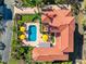 Top-down view of house, pool, and surrounding landscape at 1023 Tocobaga Ln, Sarasota, FL 34236