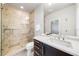 Clean and modern bathroom with a walk-in shower at 1023 Tocobaga Ln, Sarasota, FL 34236