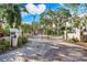 Gated community entrance with brick driveway at 1023 Tocobaga Ln, Sarasota, FL 34236