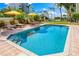 Inviting pool with ample deck space and lounge chairs at 1023 Tocobaga Ln, Sarasota, FL 34236