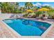 Inviting pool with ample deck space and lounge chairs at 1023 Tocobaga Ln, Sarasota, FL 34236