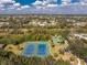 Enjoy tennis courts and a playground in this lushly landscaped community, perfect for recreation at 1069 Harbour Cape Pl, Punta Gorda, FL 33983