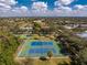 Enjoy tennis courts and a playground in this lushly landscaped community, perfect for recreation at 1069 Harbour Cape Pl, Punta Gorda, FL 33983