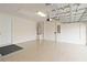 Attached garage with automatic opener and epoxy flooring at 11101 Sandhill Preserve Dr, Sarasota, FL 34238