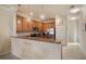 Modern kitchen with stainless steel appliances and granite countertops at 114 Babbling Brook Run, Bradenton, FL 34212